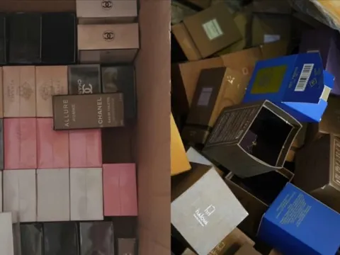 Thu giữ hàng nghìn chai nước hoa Dior, Chanel giả được pha chế từ nguyên liệu mua ở chợ Kim Biên