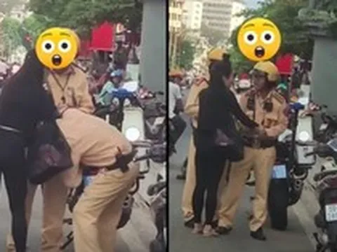 Giằng co với 2 CSGT giữa phố, giật tờ giấy xanh: Cô gái giải thích