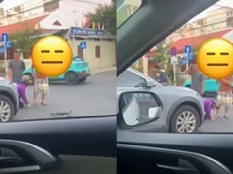 Xôn xao đoạn clip người phụ nữ quỳ giữa đường, van xin chủ ô tô sau va chạm giao thông